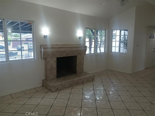 12760 Judd St, Pacoima, CA 91331 - unfurnished living room featuring a fireplace and light tile patterned floors