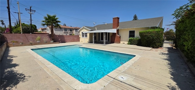 16718 Gledhill St, Northridge, CA 91343 - view of swimming pool featuring a patio area and a fenced backyard