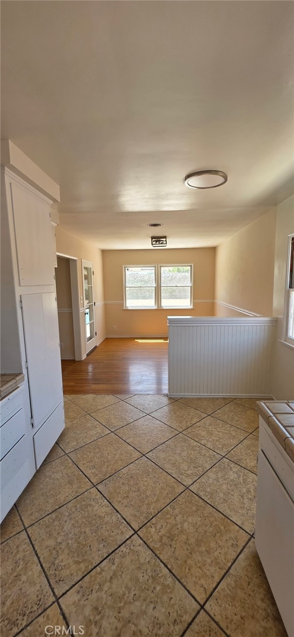 16718 Gledhill St, Northridge, CA 91343 - unfurnished room with wainscoting and light tile patterned floors