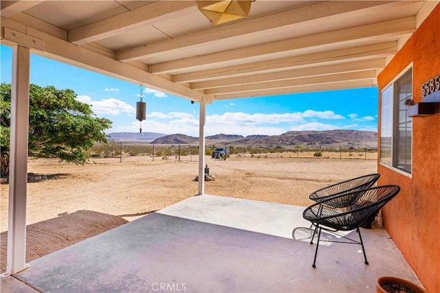 55850 Shannon Rd, Landers, CA 92285 - view of patio with a mountain view and a rural view