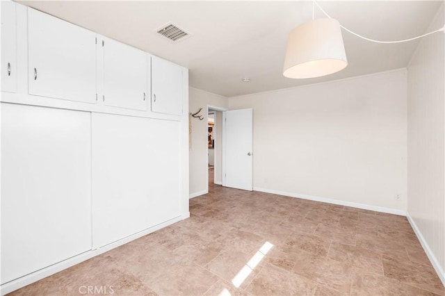 55850 Shannon Rd, Landers, CA 92285 - unfurnished bedroom with a closet and baseboards