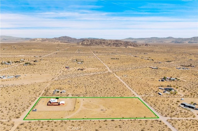 55850 Shannon Rd, Landers, CA 92285 - aerial view of sparsely populated area featuring mountains, a desert landscape, and property boundaries highlighted