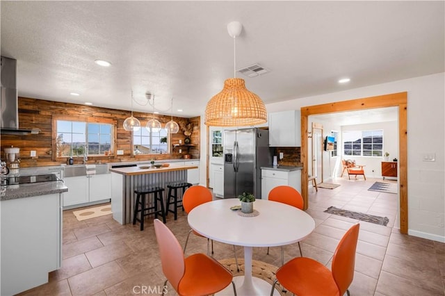 55850 Shannon Rd, Landers, CA 92285 - dining room featuring recessed lighting and light tile patterned flooring
