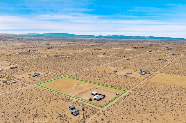 55850 Shannon Rd, Landers, CA 92285 - aerial view of sparsely populated area featuring a desert landscape, property boundaries highlighted, and mountains