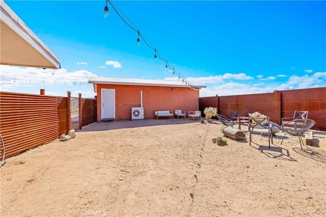 55850 Shannon Rd, Landers, CA 92285 - fenced backyard featuring washer / dryer