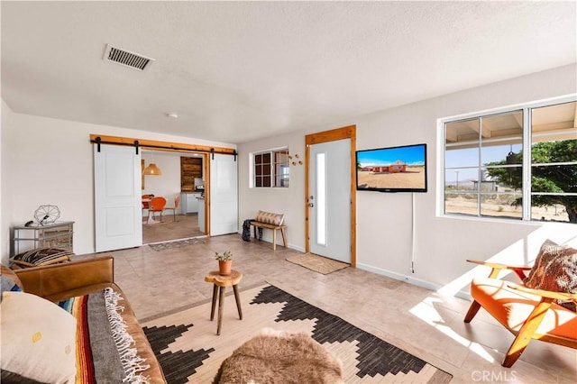55850 Shannon Rd, Landers, CA 92285 - living room with a barn door