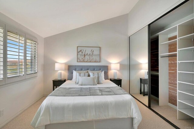 55 Jasmine Creek Dr, Corona Del Mar, CA 92625 - carpeted bedroom featuring vaulted ceiling and a closet