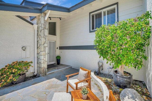 55 Jasmine Creek Dr, Corona Del Mar, CA 92625 - entrance to property featuring stucco siding
