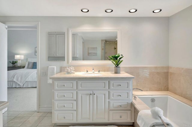 55 Jasmine Creek Dr, Corona Del Mar, CA 92625 - ensuite bathroom with vanity, tile patterned flooring, a garden tub, and a shower with door