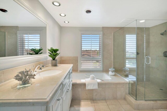 55 Jasmine Creek Dr, Corona Del Mar, CA 92625 - full bathroom featuring vanity, plenty of natural light, tile patterned flooring, a garden tub, and recessed lighting