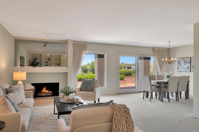 55 Jasmine Creek Dr, Corona Del Mar, CA 92625 - carpeted living room with a chandelier and a lit fireplace