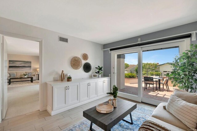 55 Jasmine Creek Dr, Corona Del Mar, CA 92625 - living room featuring wood tiled floors