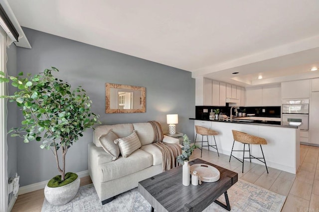 55 Jasmine Creek Dr, Corona Del Mar, CA 92625 - living area with light wood-type flooring, recessed lighting, and a raised ceiling