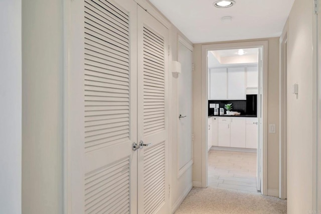 55 Jasmine Creek Dr, Corona Del Mar, CA 92625 - corridor with light colored carpet and recessed lighting