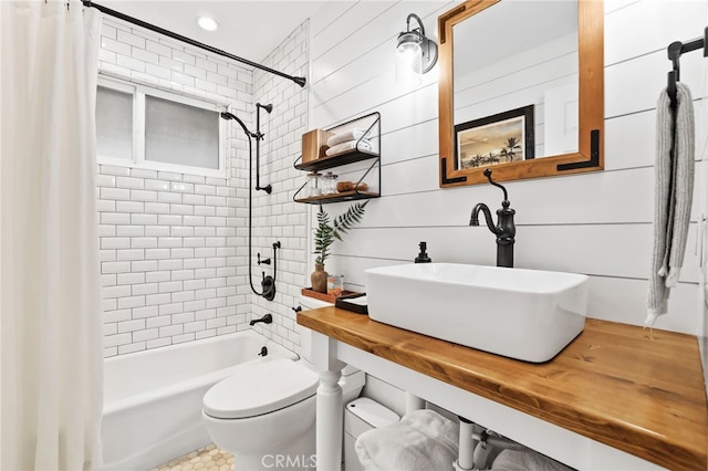 3061 Ruth Elaine, Los Alamitos, CA 90720 - bathroom featuring shower / tub combo with curtain, toilet, and vanity