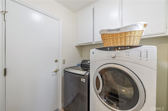 5340 Gardendale Ln, Palmdale, CA 93551 - washroom featuring cabinet space and washer and dryer