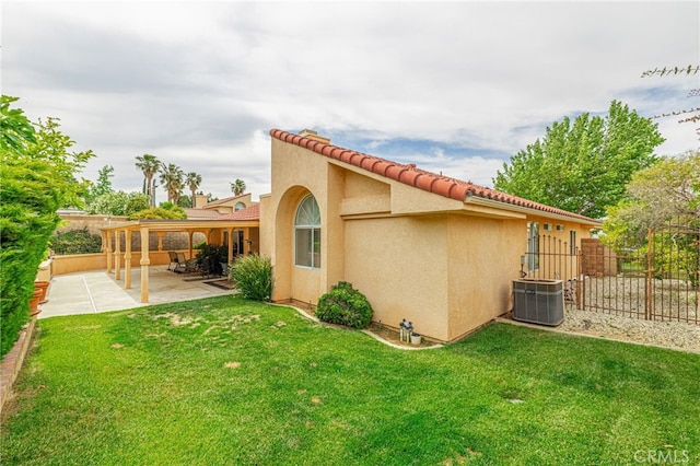5340 Gardendale Ln, Palmdale, CA 93551 - rear view of property with stucco siding, cooling unit, and a patio