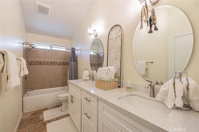5340 Gardendale Ln, Palmdale, CA 93551 - full bath featuring double vanity, shower / bath combination with curtain, toilet, baseboards, and stone finish flooring