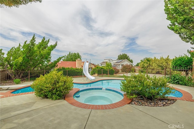 5340 Gardendale Ln, Palmdale, CA 93551 - view of pool with a water slide, a patio area, and a pool with connected hot tub