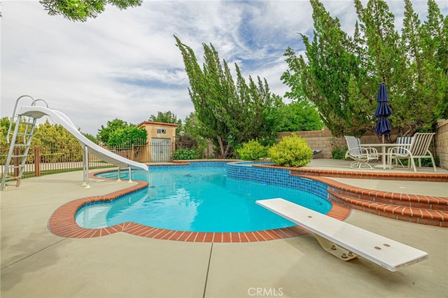 5340 Gardendale Ln, Palmdale, CA 93551 - view of swimming pool with a diving board, a patio, and a water slide