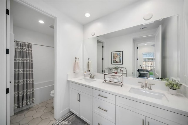 4019 Hillside Dr, San Luis Obispo, CA 93401 - full bath featuring double vanity, tile patterned flooring, shower / tub combo, and recessed lighting