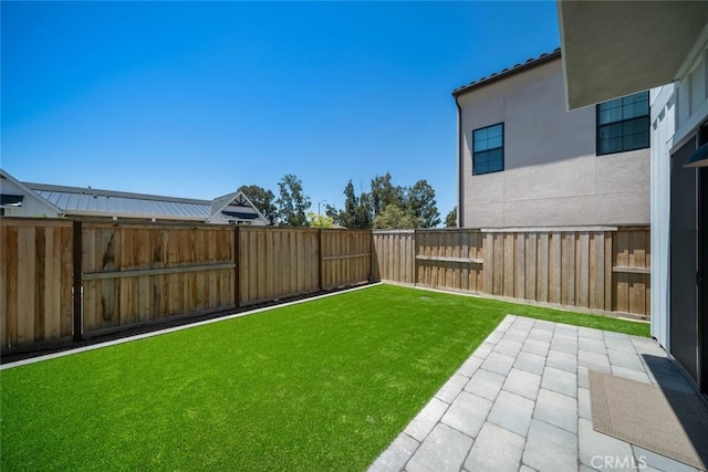4019 Hillside Dr, San Luis Obispo, CA 93401 - fenced backyard with a patio area