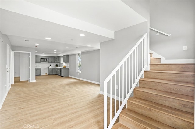 500 N Brannick Ave Unit 2, City Terrace, CA 90063 - staircase with recessed lighting, baseboards, and wood finished floors