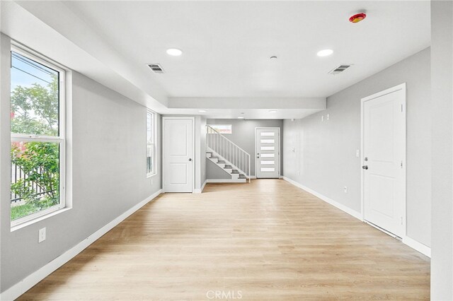 500 N Brannick Ave Unit 2, City Terrace, CA 90063 - spare room featuring baseboards, stairway, light wood-style floors, and recessed lighting