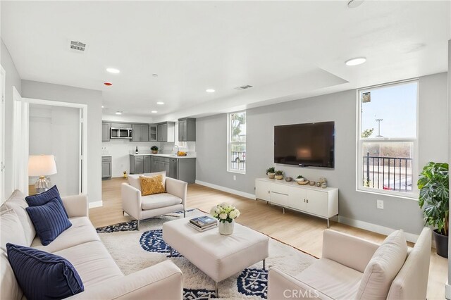 500 N Brannick Ave Unit 2, City Terrace, CA 90063 - living area featuring light wood-style flooring, baseboards, and recessed lighting