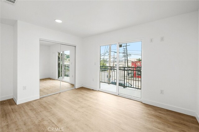 500 N Brannick Ave Unit 2, City Terrace, CA 90063 - empty room featuring light wood-style flooring, baseboards, and recessed lighting