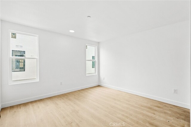 500 N Brannick Ave Unit 2, City Terrace, CA 90063 - empty room with light wood-style flooring, baseboards, and recessed lighting
