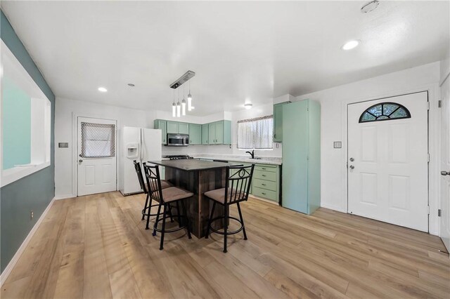 3206 4th St, Clearlake, CA 95422 - dining space with light wood finished floors, baseboards, healthy amount of natural light, and recessed lighting