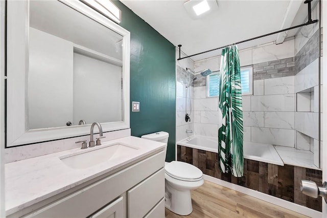 3206 4th St, Clearlake, CA 95422 - bathroom with tiled shower / bath, toilet, vanity, and wood finished floors