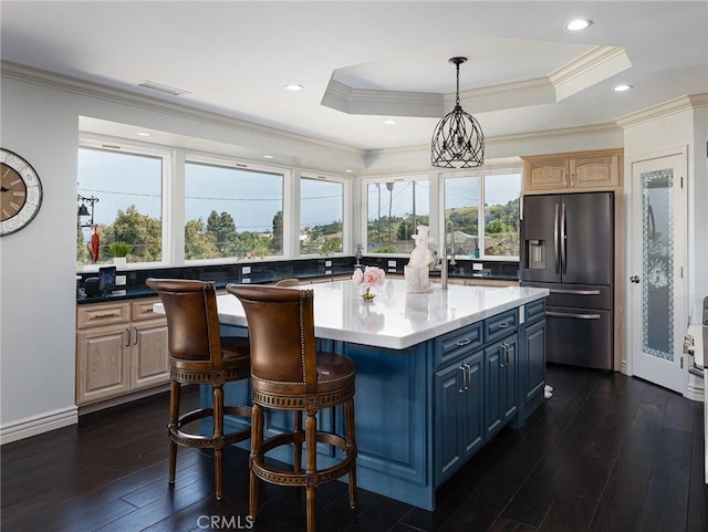 30229 Kingsridge Dr, Rancho Palos Verdes, CA 90275 - kitchen featuring stainless steel fridge, dark wood-style floors, a center island, light countertops, and a breakfast bar area
