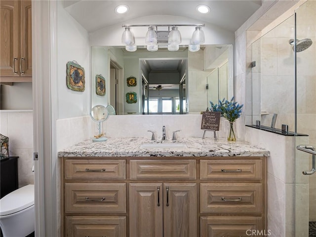 30229 Kingsridge Dr, Rancho Palos Verdes, CA 90275 - full bath with tile walls, vanity, a stall shower, toilet, and recessed lighting