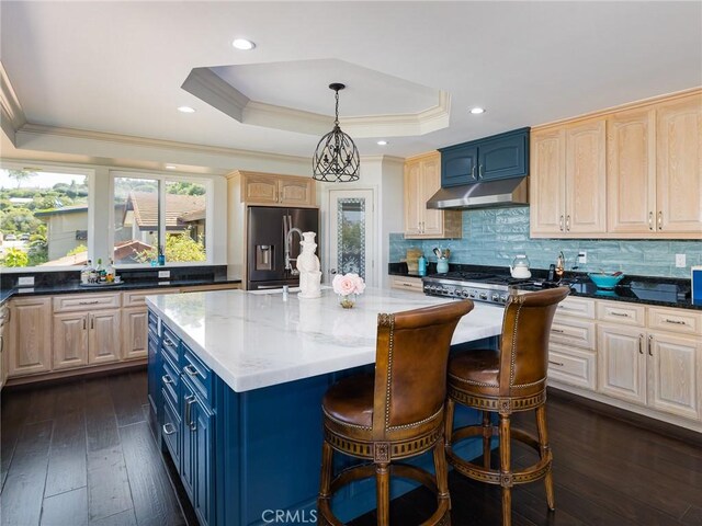 30229 Kingsridge Dr, Rancho Palos Verdes, CA 90275 - kitchen featuring stainless steel fridge, a raised ceiling, ornamental molding, light stone countertops, and light brown cabinets