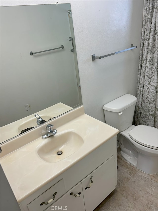 28711 Del Monte Dr, Menifee, CA 92586 - bathroom featuring vanity, toilet, and tile patterned flooring