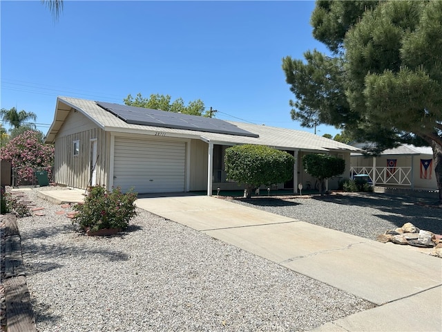 28711 Del Monte Dr, Menifee, CA 92586 - single story home featuring an attached garage, roof mounted solar panels, and concrete driveway