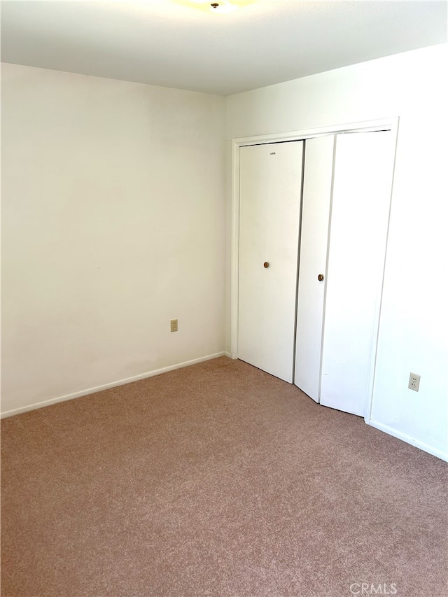 28711 Del Monte Dr, Menifee, CA 92586 - unfurnished bedroom with carpet floors, a closet, and baseboards