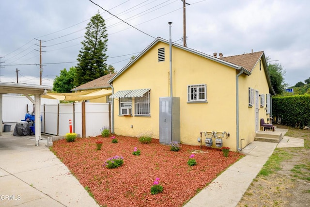 5621 Carlota Blvd, Los Angeles, CA 90042 - view of front of property featuring stucco siding, cooling unit, and roof with shingles