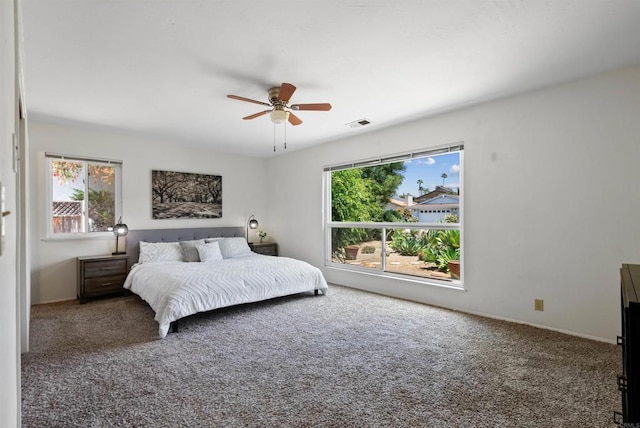 2745 La Gran Via, Carlsbad, CA 92009 - bedroom with carpet, ceiling fan, and baseboards