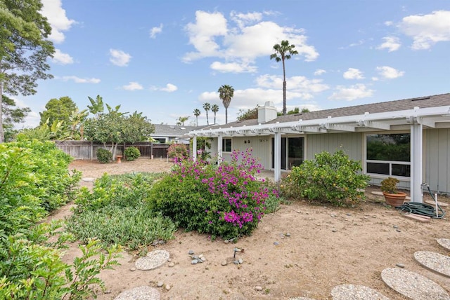 2745 La Gran Via, Carlsbad, CA 92009 - back of house featuring a pergola and a chimney