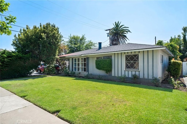 1714 N Towner St, Santa Ana, CA 92706 - view of front of property featuring board and batten siding and a front yard
