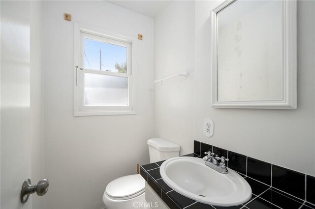 1714 N Towner St, Santa Ana, CA 92706 - half bath featuring toilet and vanity