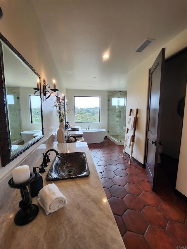 1010 Willowcreek Ln, Fallbrook, CA 92028 - full bathroom featuring a soaking tub, a stall shower, tile patterned flooring, and recessed lighting
