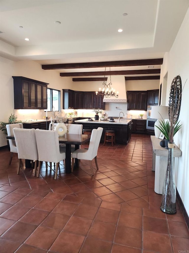 1010 Willowcreek Ln, Fallbrook, CA 92028 - dining space with a chandelier, recessed lighting, dark tile patterned floors, and beamed ceiling