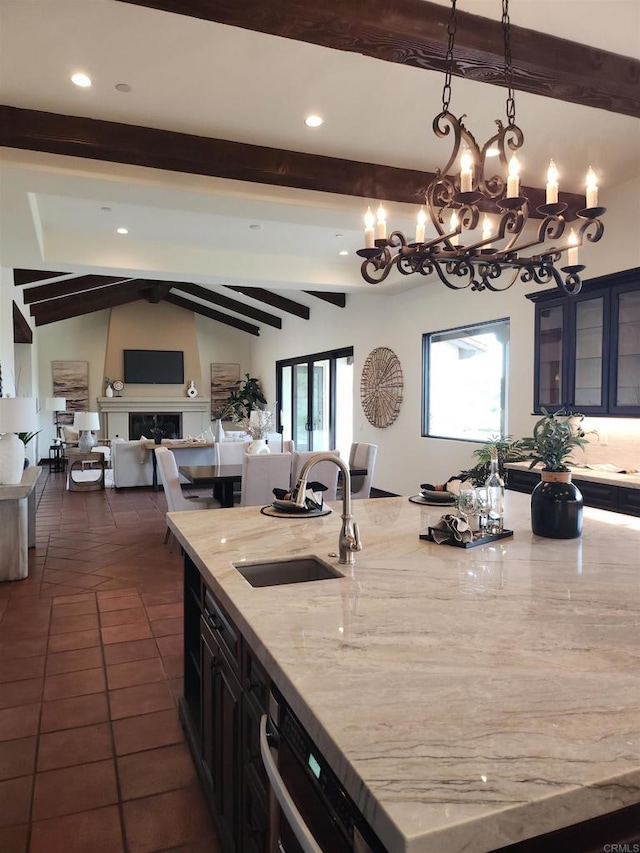 1010 Willowcreek Ln, Fallbrook, CA 92028 - kitchen with a chandelier, open floor plan, decorative light fixtures, glass insert cabinets, and recessed lighting