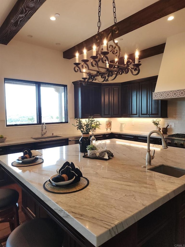 1010 Willowcreek Ln, Fallbrook, CA 92028 - kitchen featuring custom exhaust hood, light stone countertops, a breakfast bar, a spacious island, and recessed lighting