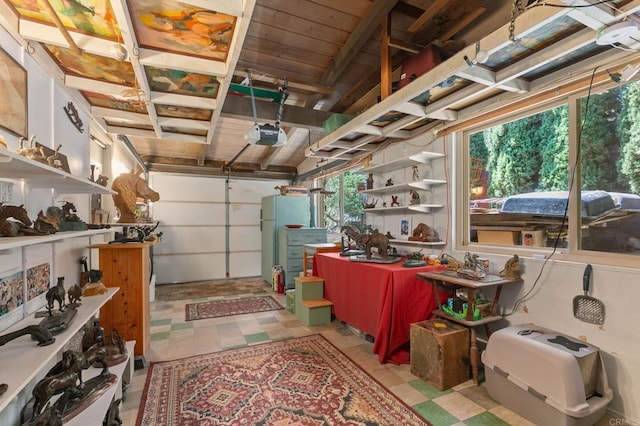 3314 Via Altamira, Fallbrook, CA 92028 - garage with freestanding refrigerator, wooden ceiling, and a garage door opener