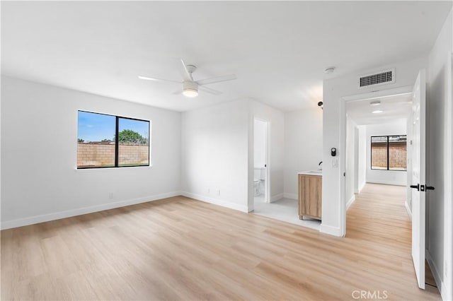 42346 W 47th St W, Lancaster, CA 93536 - unfurnished room featuring light wood-style flooring, ceiling fan, baseboards, and a smoke detector